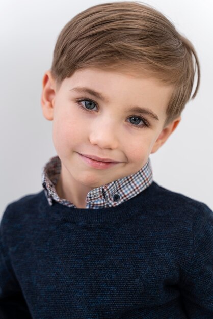 Portrait little boy wearing lens