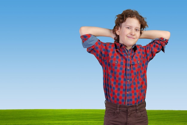 Portrait of little boy with hands folded