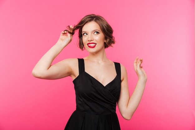 Portrait of a lovely girl dressed in black dress