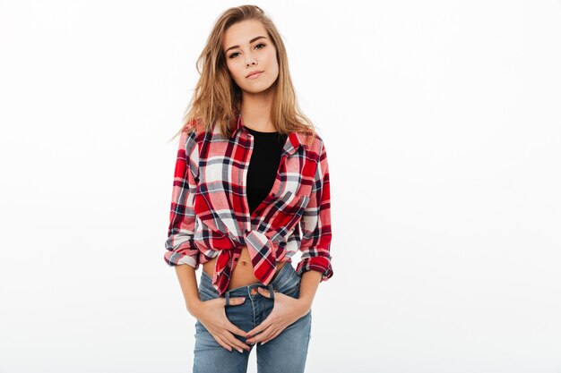 Portrait of a lovely pretty girl in plaid shirt