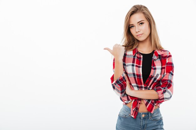 Portrait of a lovely pretty girl in plaid shirt