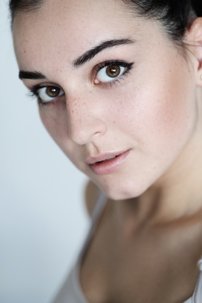 Portrait of lovely young woman posing