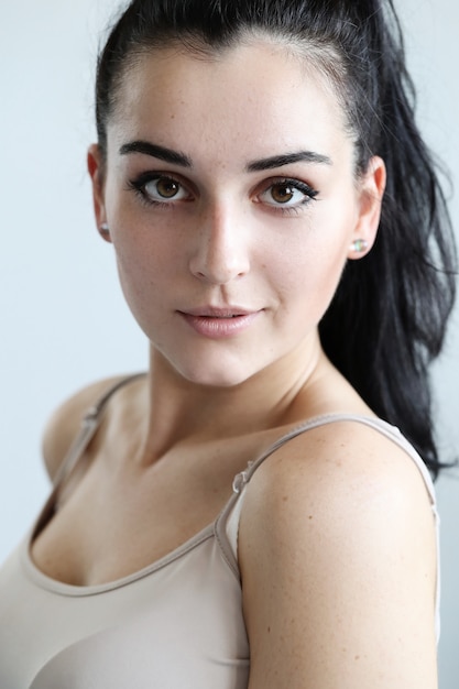 Portrait of lovely young woman posing