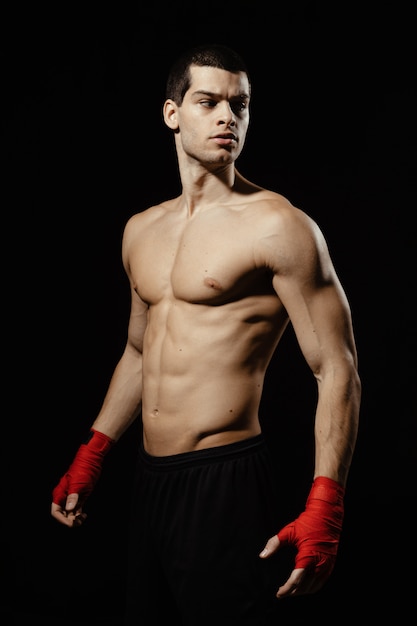 Portrait of male boxer posing