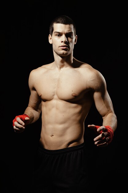 Portrait of male boxer posing