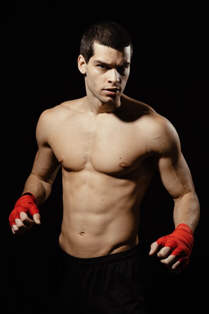 Portrait of male boxer posing