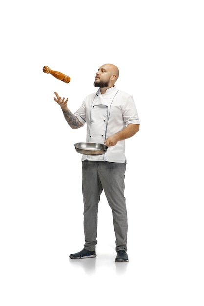 Portrait of a male chef cook, butcher isolated on a white studio.