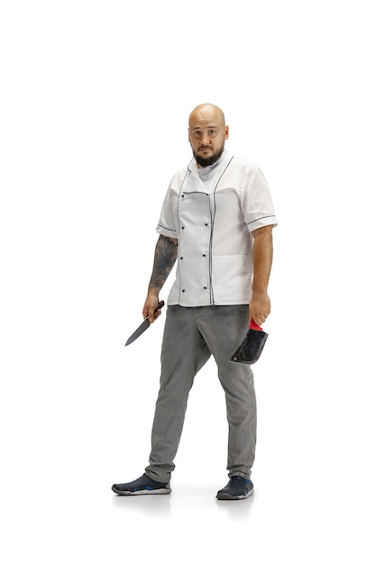 Free photo portrait of a male chef cook, butcher isolated on a white studio.