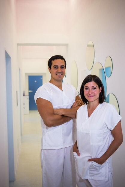 Portrait of male and female dentist smiling