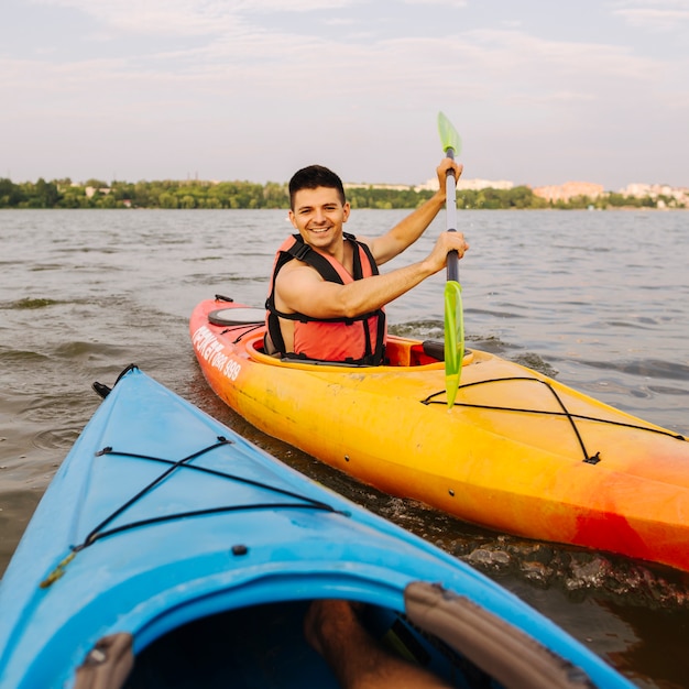 Portrait of male kayaker kayaking