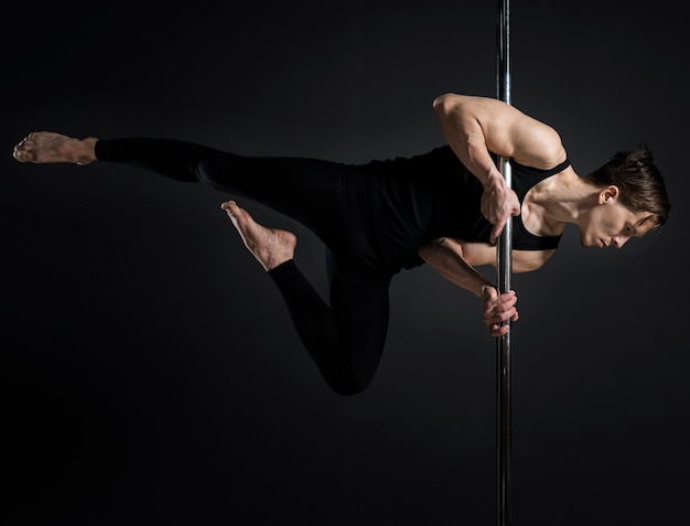 Portrait of male pole dancer
