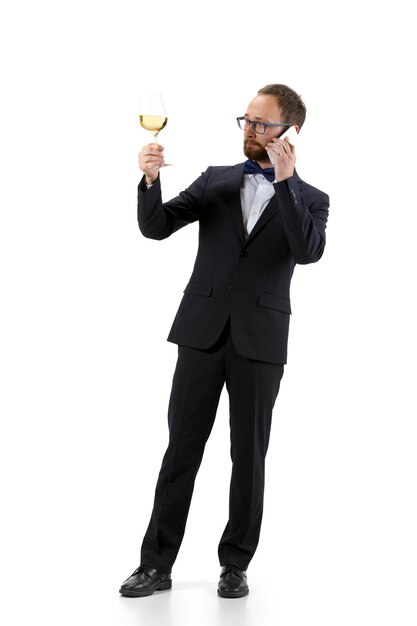 Portrait of male sommelier in suit isolated on white