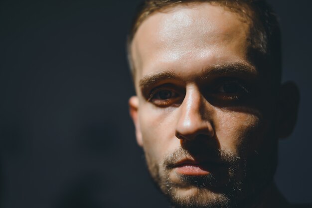 portrait of a man. close-up of a hard light