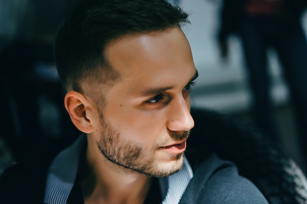 portrait of a man. close-up of a hard light