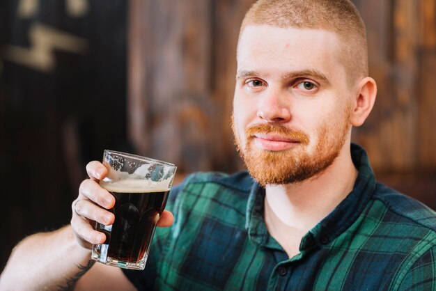 Portrait of a man drinking rum