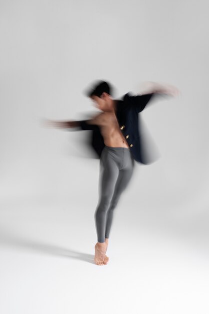 Portrait of man expressing body language through movement