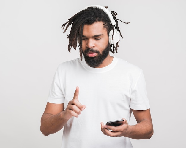 Portrait of a man listening to music