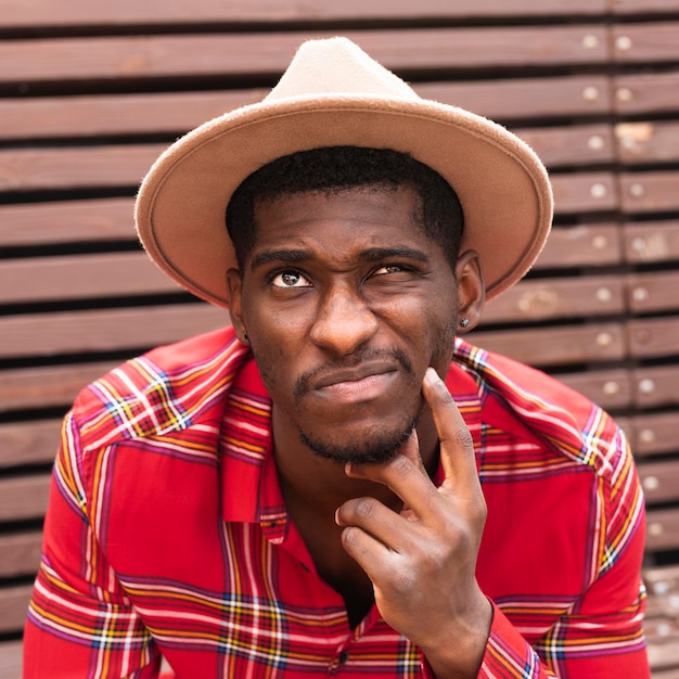 Portrait of man looking up and thinking