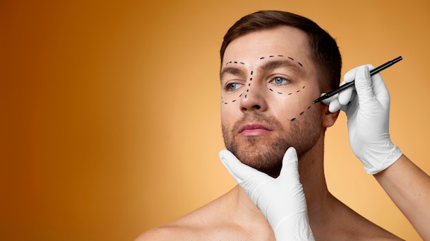 Free photo portrait of man receiving enhancements and tweakments through the help of cosmetic procedures