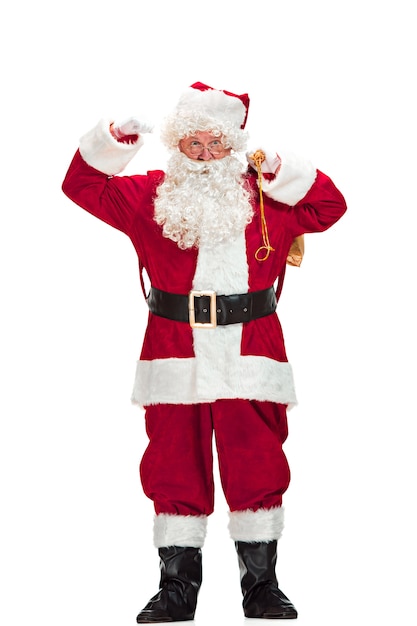 Portrait of Man in Santa Claus costume with a Luxurious White Beard, Santa's Hat and a Red Costume - in Full Length isolated on White