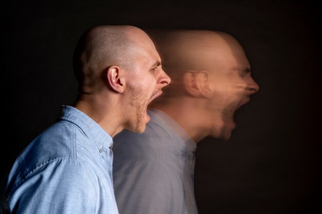 Portrait of man suffering from schizophrenia