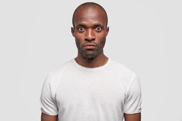 Portrait of man in white T-shirt