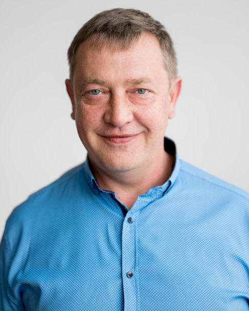 Portrait of man with blue shirt