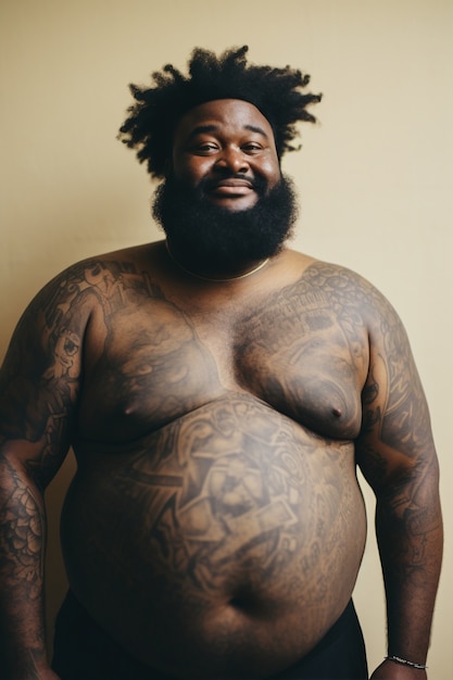 Free photo portrait of man with body tattoos