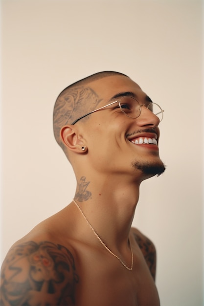 Free photo portrait of man with body tattoos