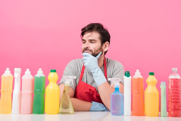 Portrait of man with cleaning product