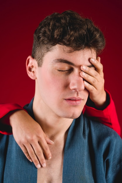 Portrait of man with his eyed covered 