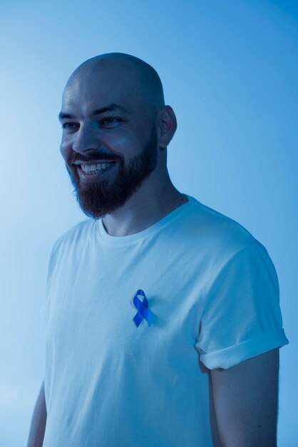 Portrait of man with prostate cancer ribbon