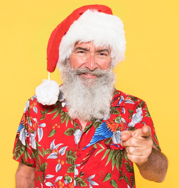 Portrait of man with tropical and christmas concept