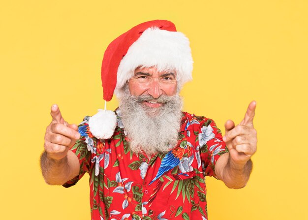 Portrait of man with tropical and christmas concept