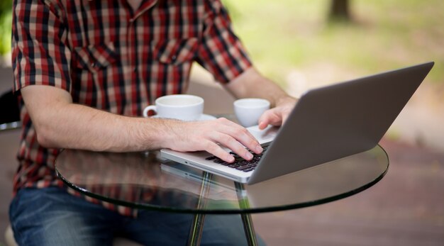 Portrait of man working with laptop