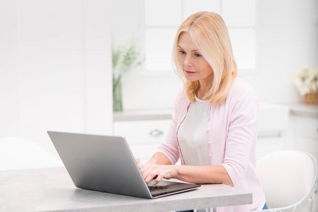 Portrait of mature woman working from home