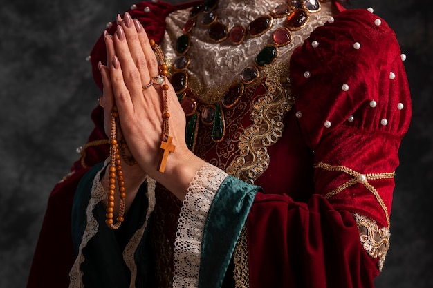 Portrait of medieval queen with rosary