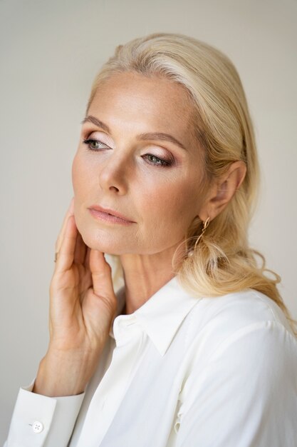 Portrait of middle-aged blonde rich woman
