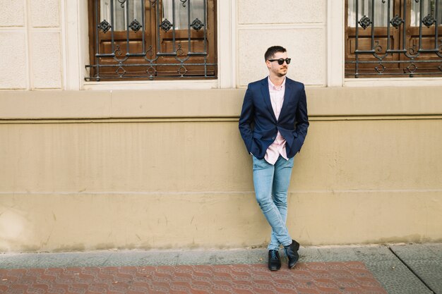 Portrait of modern businessman outdoors