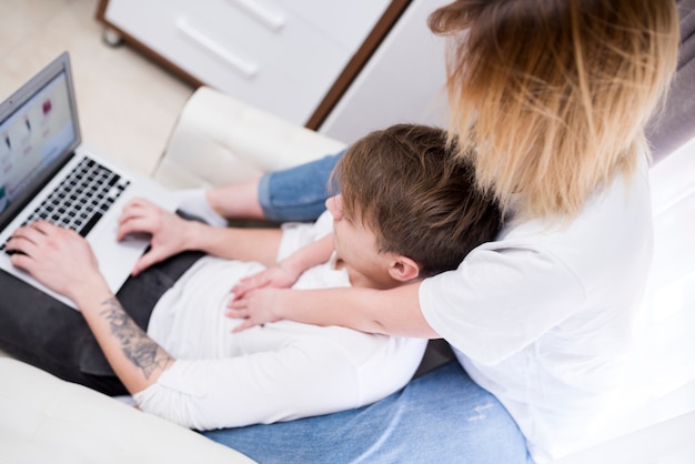 Portrait of modern couple at home