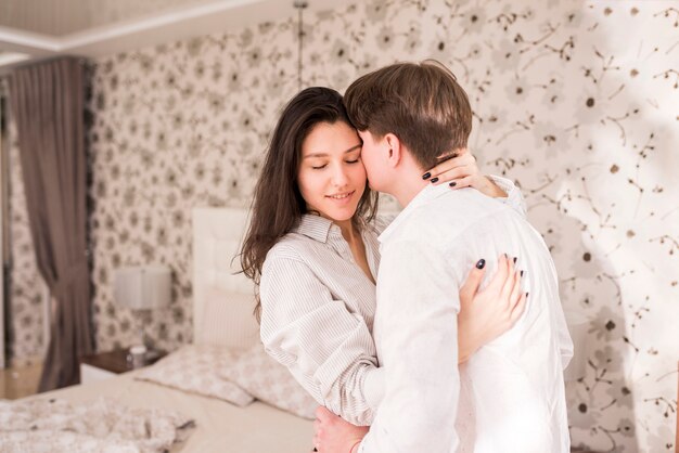 Portrait of modern couple at home