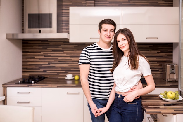 Portrait of modern couple at home