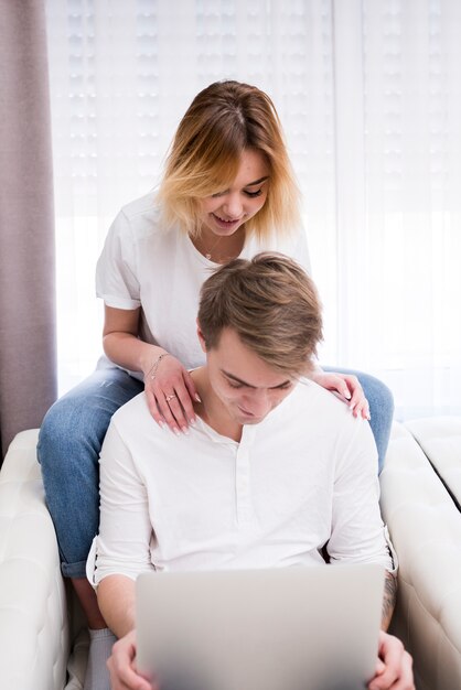 Portrait of modern couple at home