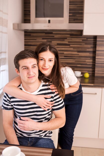 Portrait of modern couple at home