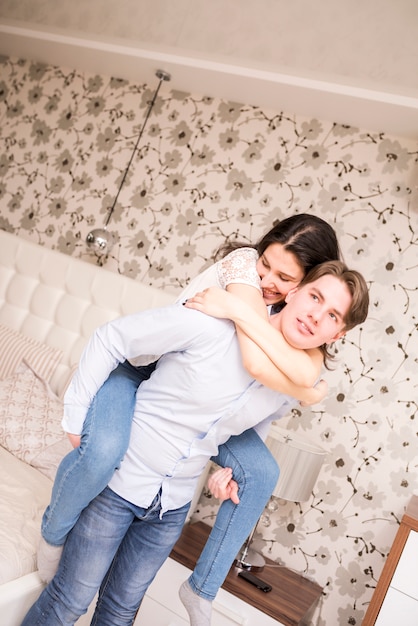 Portrait of modern couple at home