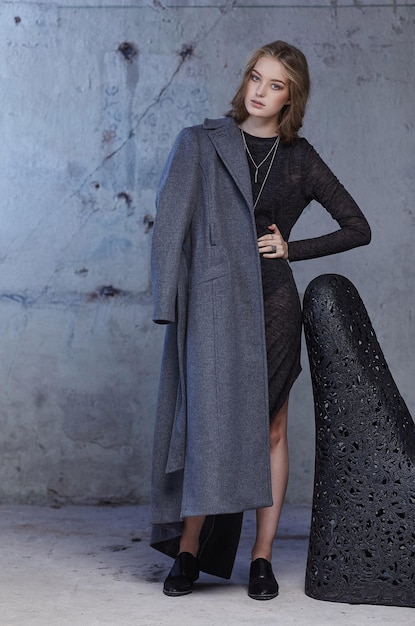 Free photo portrait of modern female in a grey coat.