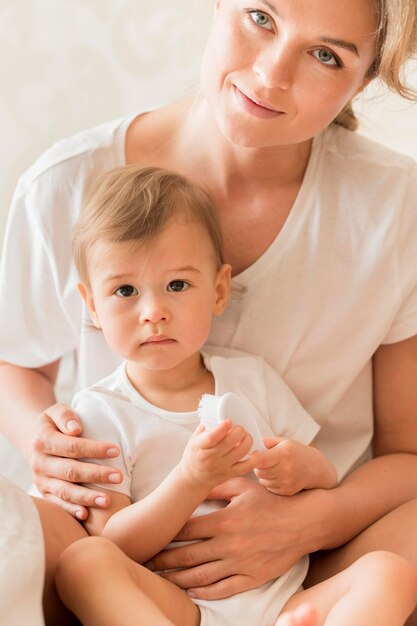 Portrait of mom holding baby