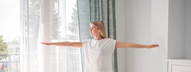 Portrait mom stretching arms