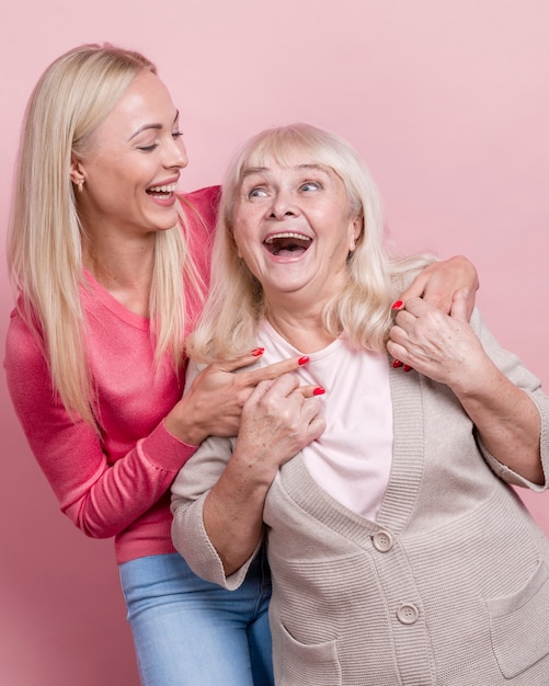 Portrait of mother and daughter fooling around