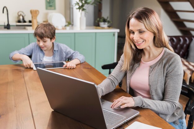 Portrait of mother happy to work from home